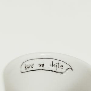 Porcelain cup inspired by Ivan Cankar text inside of the cup