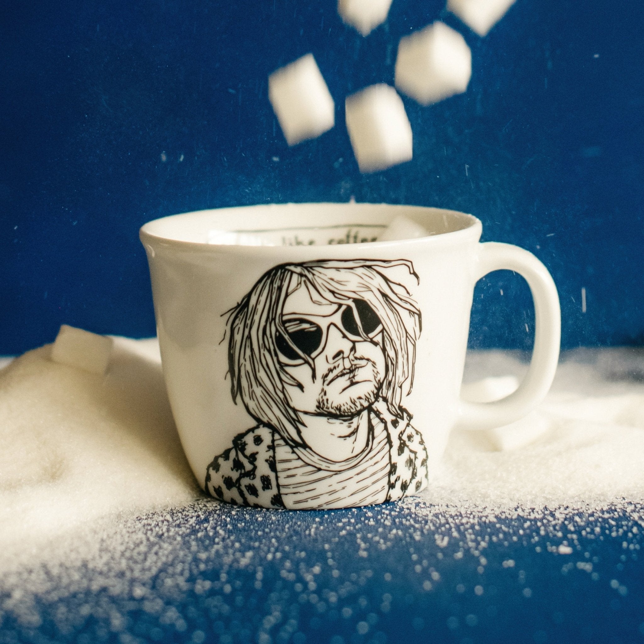 Porcelain cup inspired by Kurt Cobain with sugar