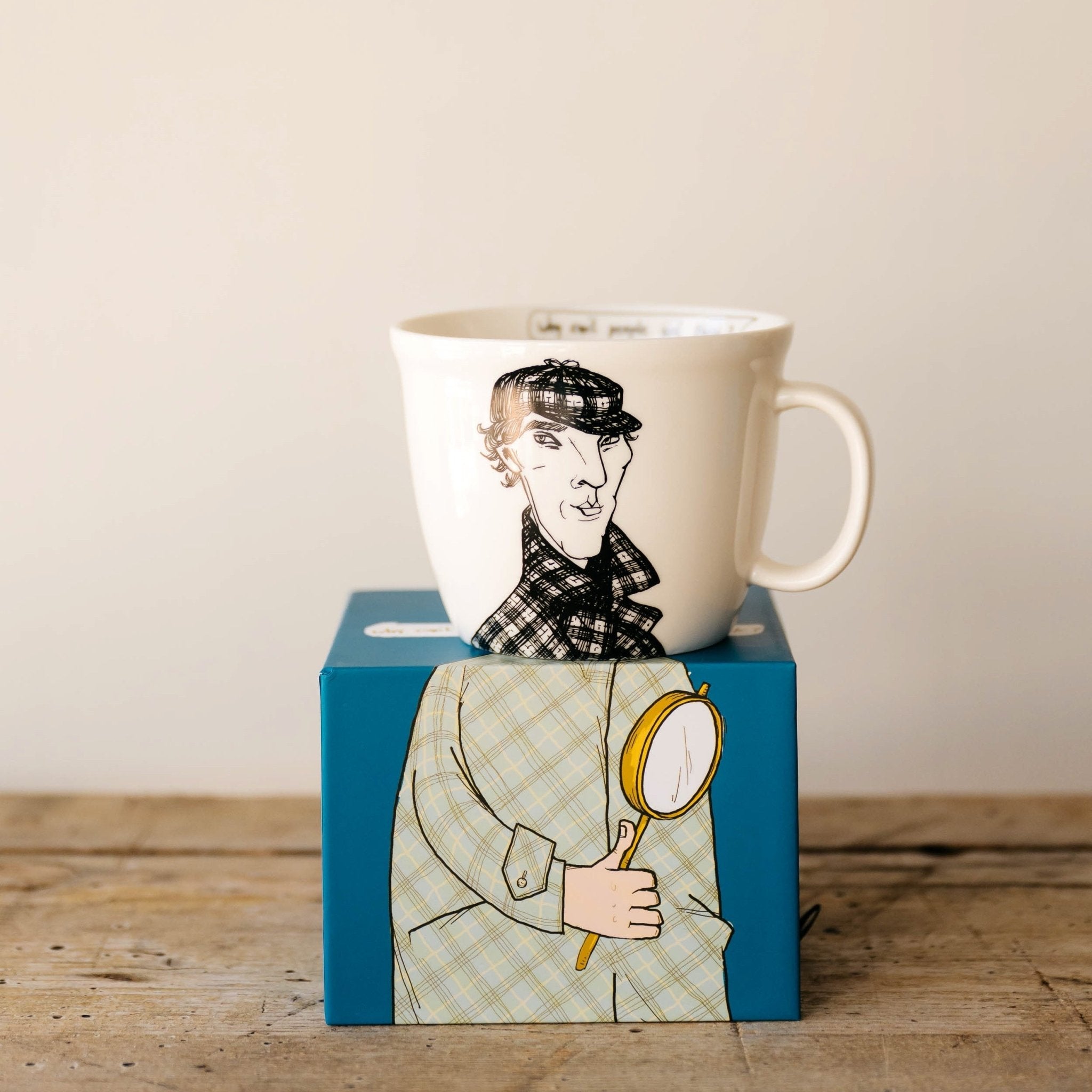 Porcelain cup inspired by Sherlock Holmes on the box