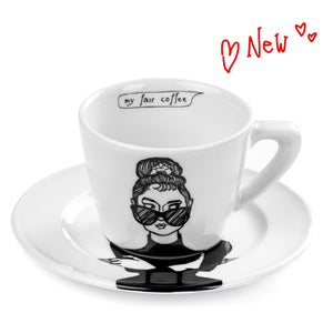 Cup and saucer with a design of a woman wearing sunglasses and the text 'my fair coffee' on a white background.