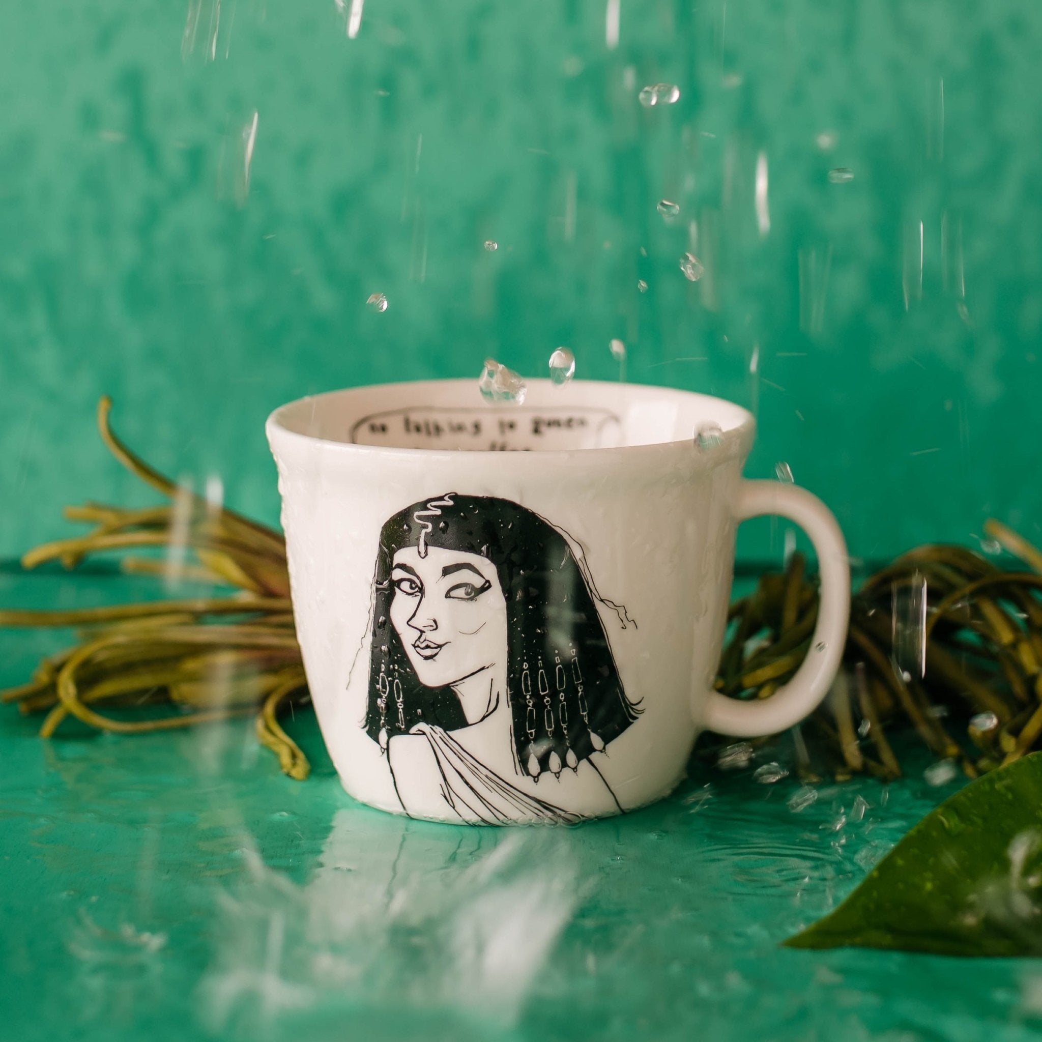 Porcelain cup inspired by Cleopatra with water