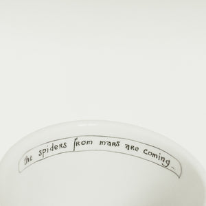 Porcelain cup inspired by David Bowie text inside of the cup