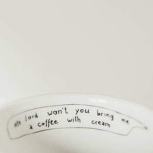 Porcelain cup inspired by Janis Joplin text inside of the cup