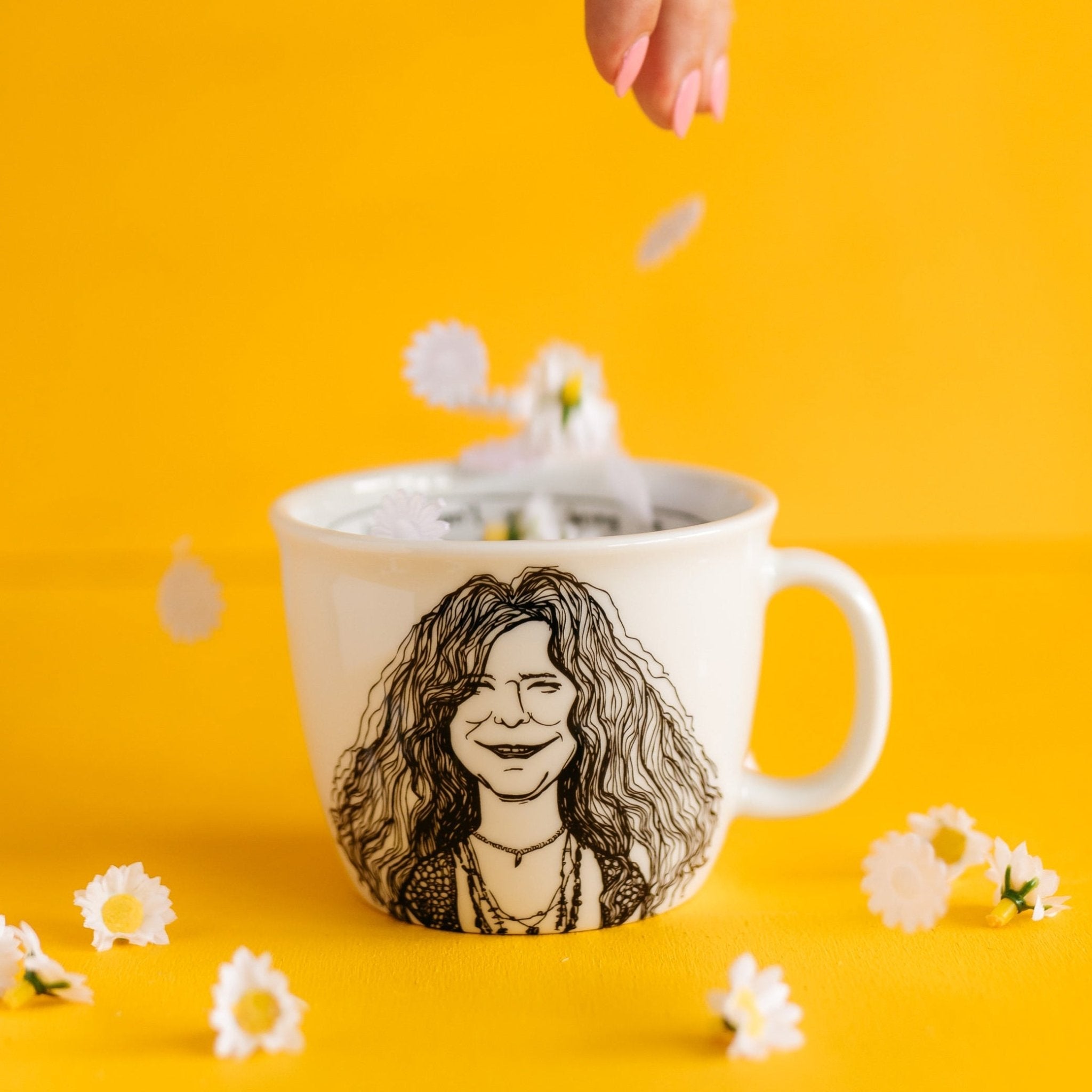 Porcelain cup inspired by Janis Joplin with daisies