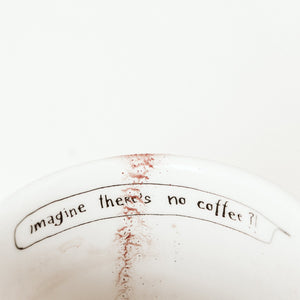 Porcelain cup inspired by John Lennon text inside of the cup