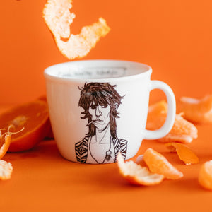 Porcelain cup inspired by Keith Richards with oranges