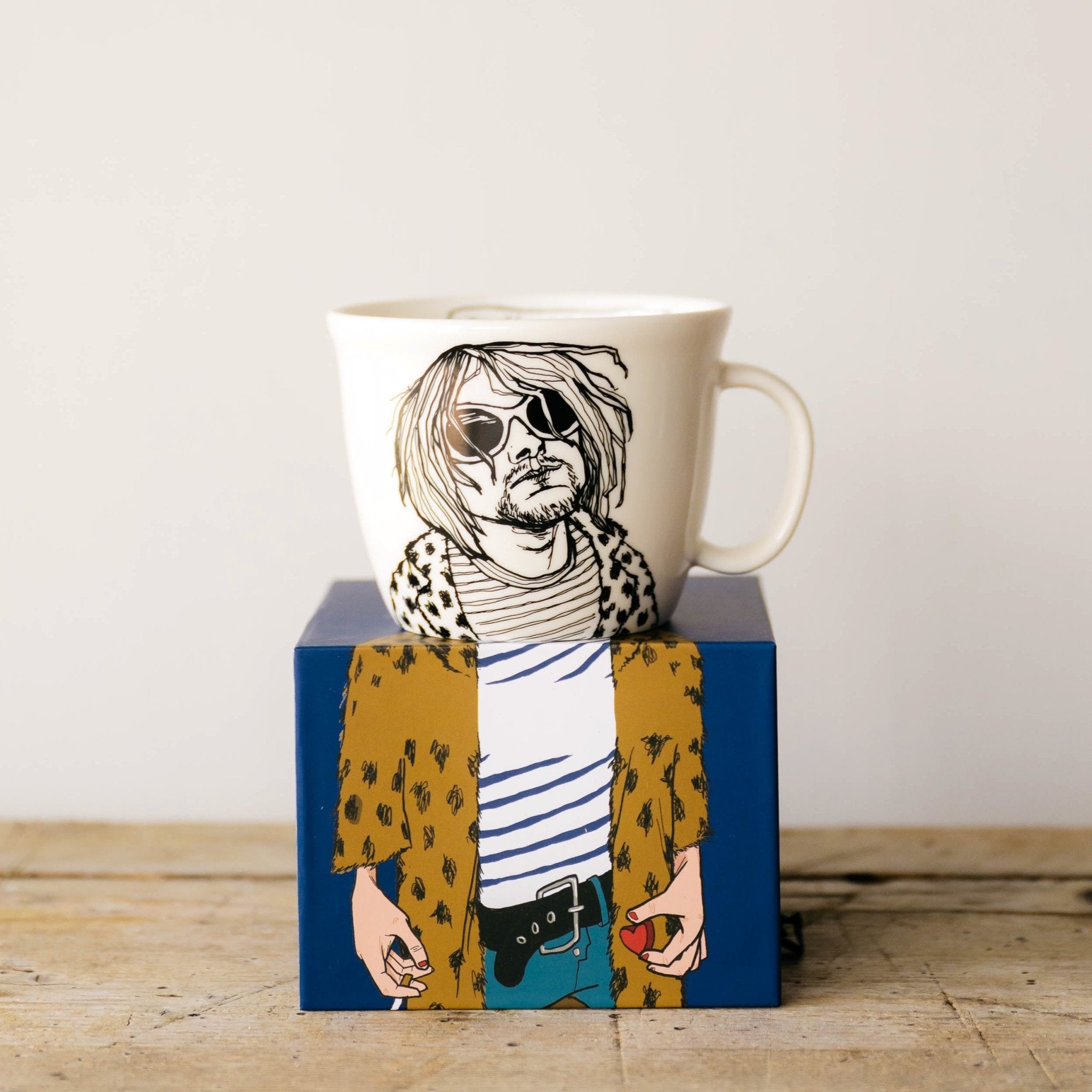 Porcelain cup inspired by Kurt Cobain on the box
