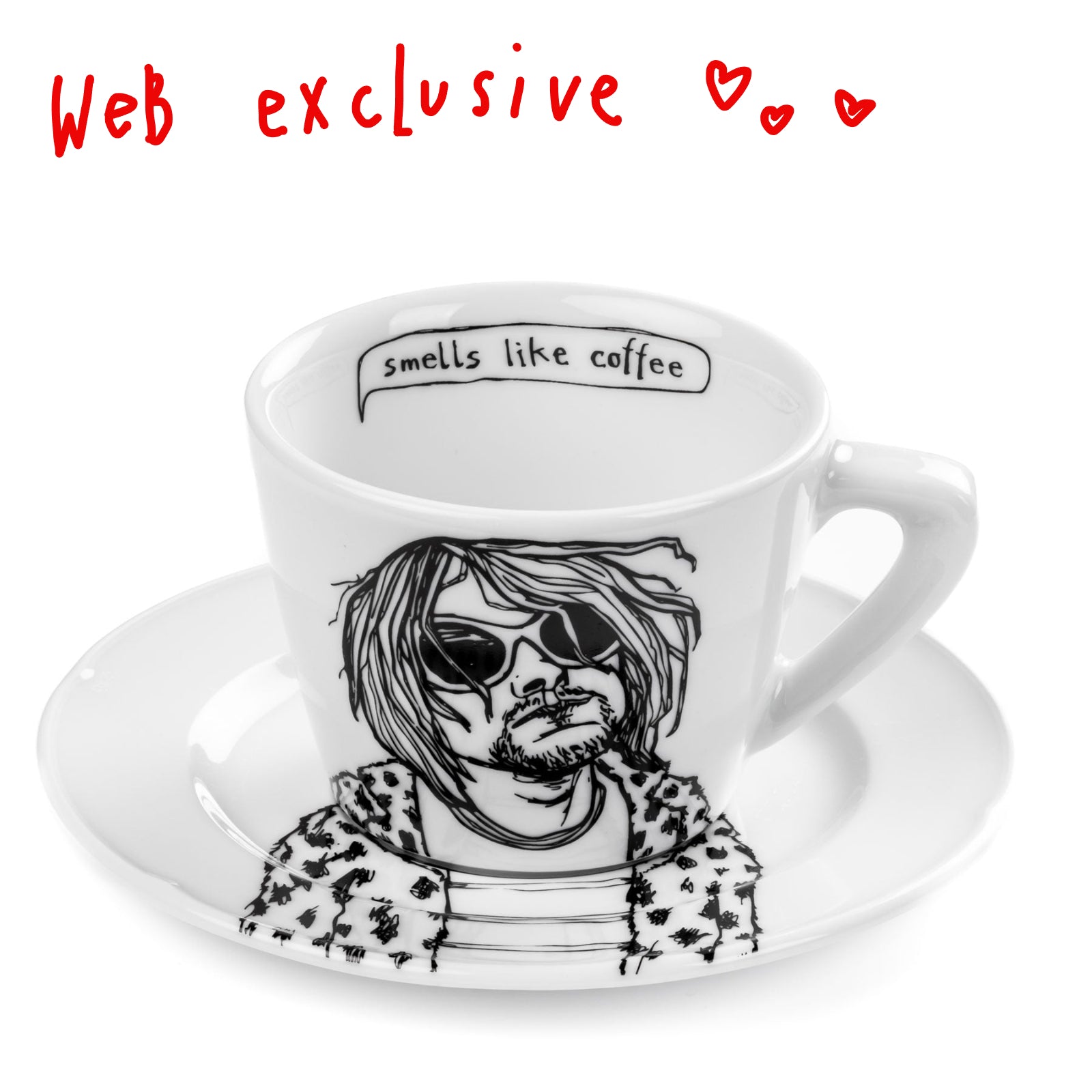 porcelain cup and saucer with a black and white illustration of a person and text 'smells like coffee' on a white background.