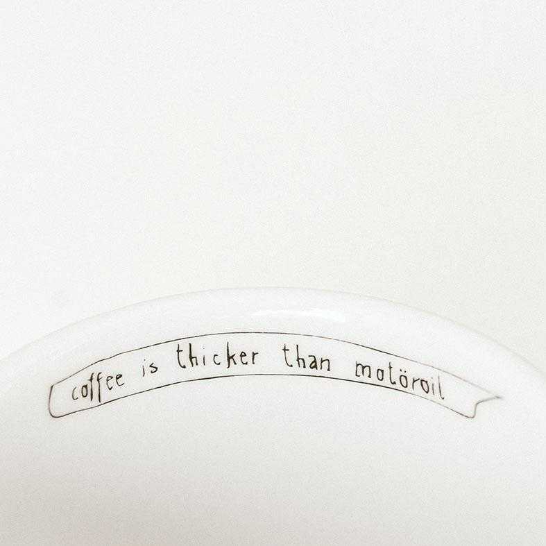 Porcelain cup inspired by Lemmy Kilmister text inside of the cup