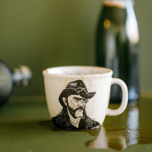 Porcelain cup inspired by Lemmy Kilmister with coffee