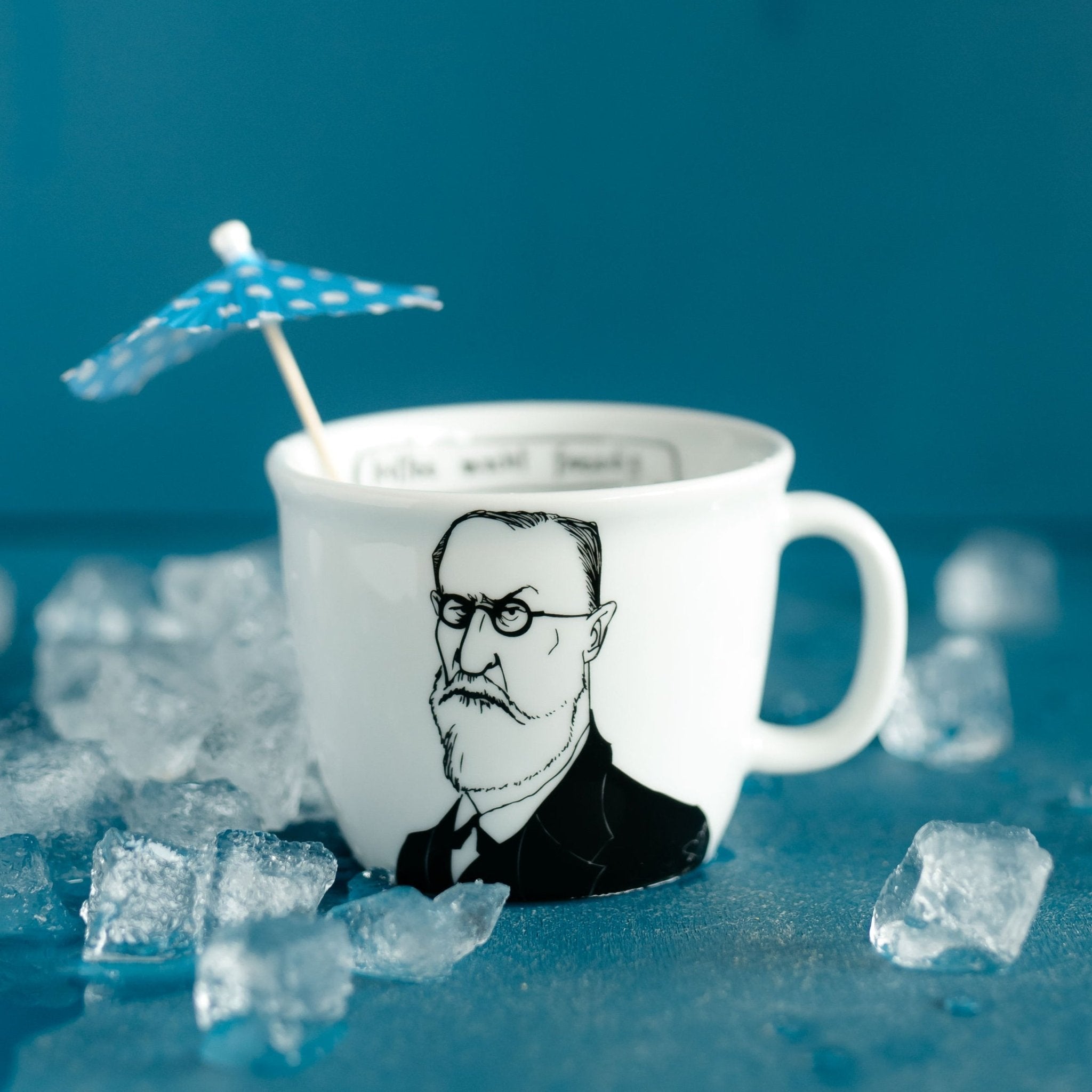 Porcelain cup inspired by Sigmund Freud with ice and umbrella