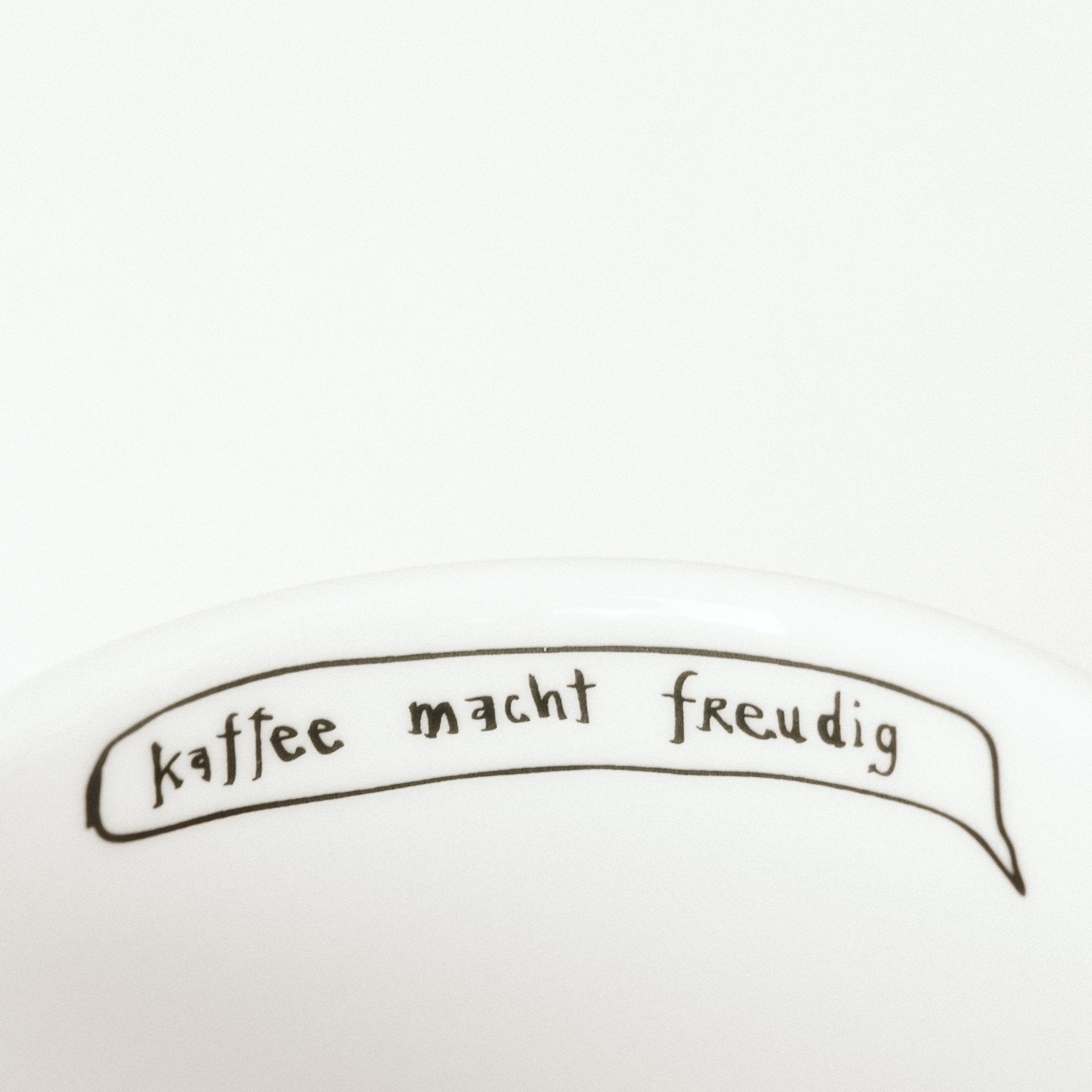 Porcelain cup inspired by Sigmund Freud text inside of the cup