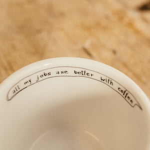 Porcelain cup inspired by Steve Jobs text inside of the cup