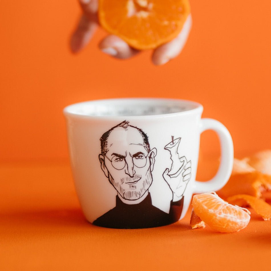 Porcelain cup inspired by Steve Jobs with oranges