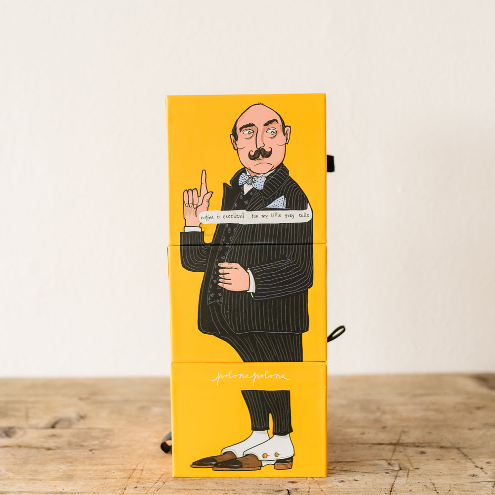 great packaging box that must be real eye catcher in shops. Showing inspired illustration of Belgian detective Hercule Poirot in a striped suit and shoes with white spacks, on a yellow background