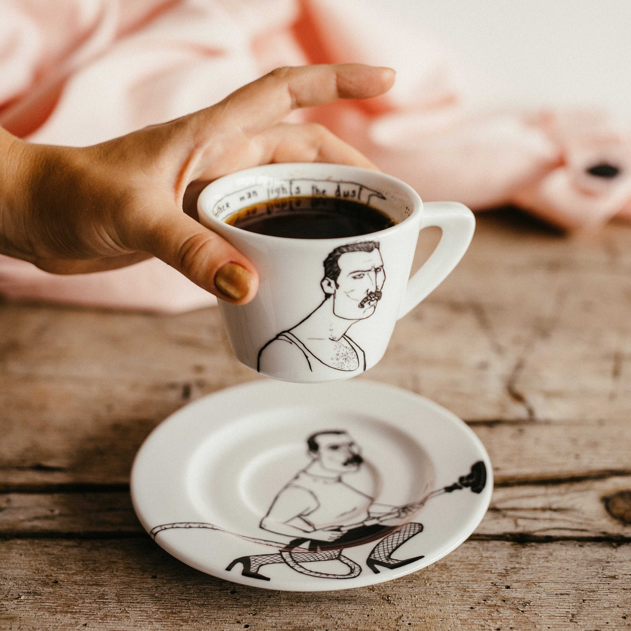 Hand holding Polonapolona FREDDIE 180ml porcelain white cappuccino set of porcelain cup and saucer