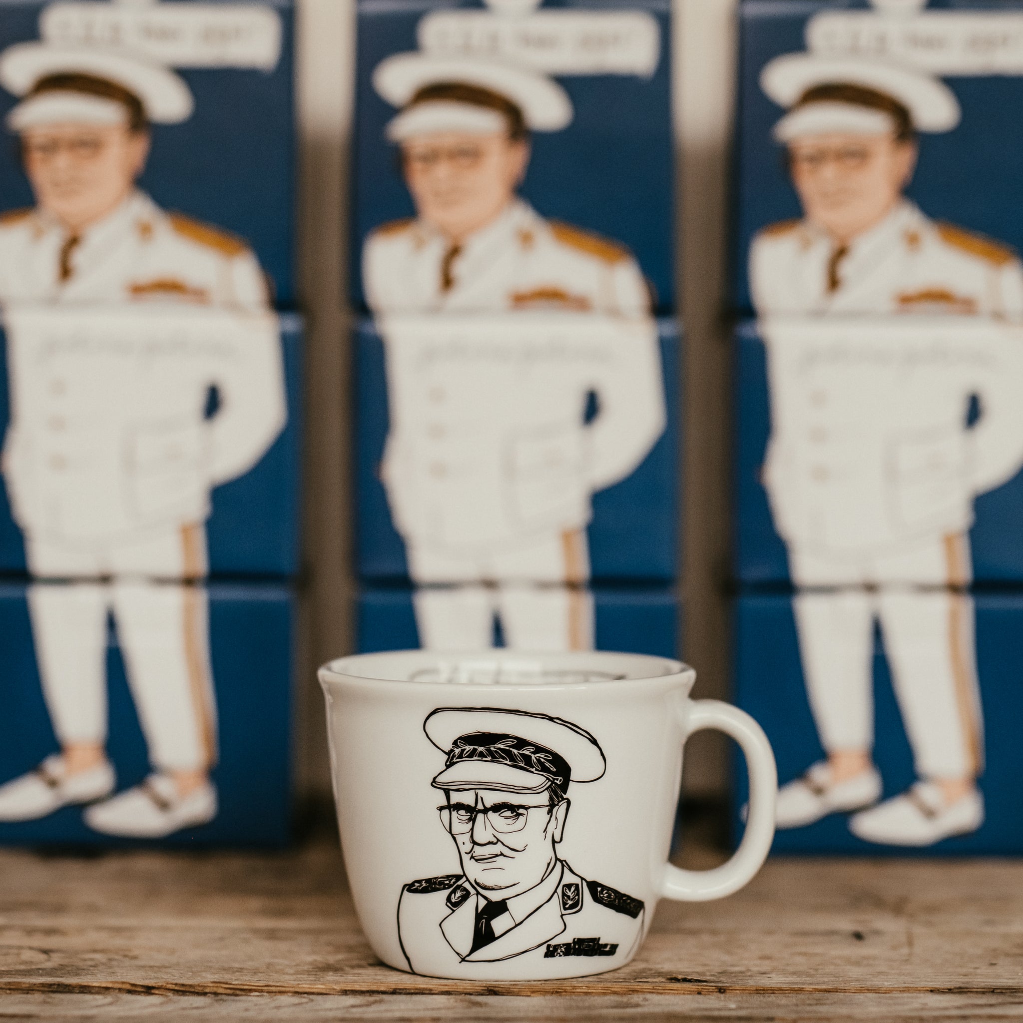 Polonapolona JOSIP 350ml porcelain white big cup in front of boxes with Josip illustration